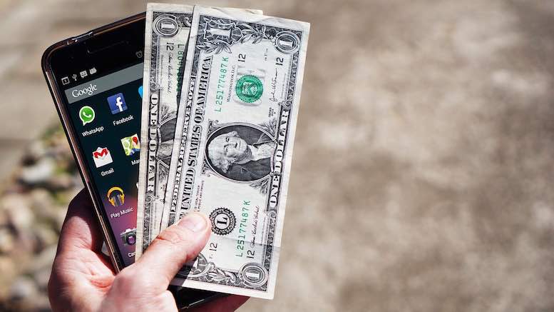 mobile-phone-cash-money-dollar-hand