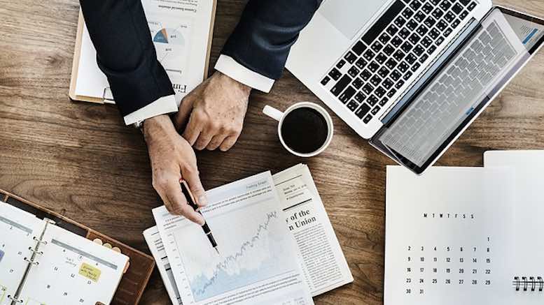 analysis-research-graphs-numbers-office-computer-desk-consultant