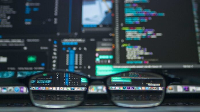 spectacles-glasses-computer-laptop-screen-data-information-programs-implied-menace-threat