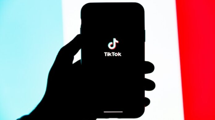 TikTok-logo-phone-social-media