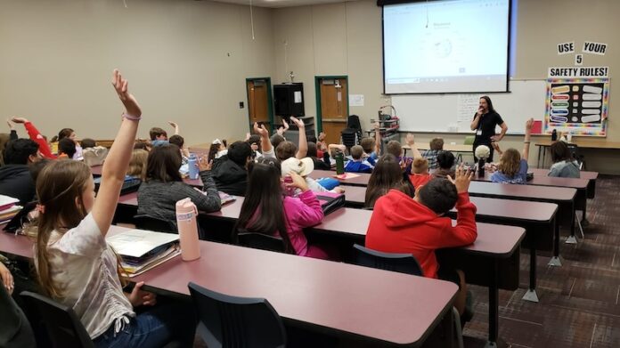 Eric Priezkalns speaking to schoolkids in Granbury TX